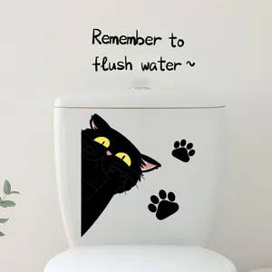 Schwarze Katze Toilettenaufkleber mit gelben Augen und englischem Spruch für das Badezimmer