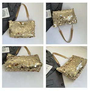 Détail du sac cabas à paillettes dorées avec bandoulière chaîne et texture brillante