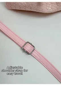 Detailed close-up of the adjustable pink leather strap with silver metal buckle hardware