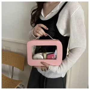 Trousse à maquillage rose en cuir PU avec fenêtre transparente et fermeture éclair dorée