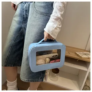 Détails de trousse de maquillage bleue avec fermetures cœur et fenêtre PVC claire