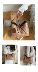 Detail of khaki quilted shoulder bag featuring elegant bow tie and diamond patterns