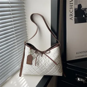 Retro large capacity white quilted tote bag with brown straps and bow detail