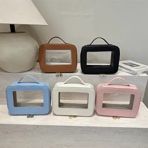 Trousses de toilette transparentes en PVC en cinq couleurs avec poignée et double fermeture