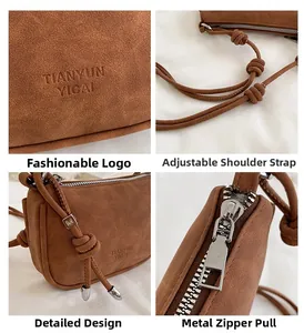 Detailansicht der braunen Wildledertasche mit silbernen Beschlägen und Schultergurt