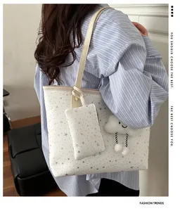 Polka dot bow tote bag with star pattern coin purse and plush cloud charm accessory