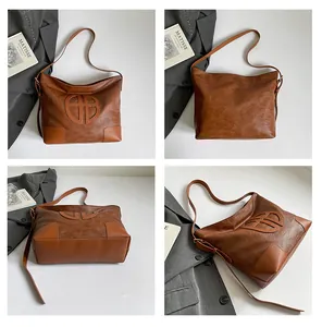 Vues détaillées d'un sac cabas rétro marron montrant l'avant, l'arrière, le côté et la base