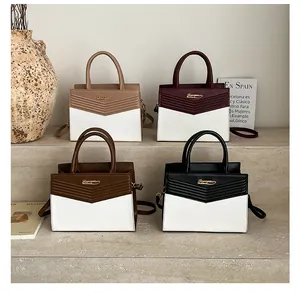 Detailed comparison of four two-tone cross-body handbags with textured V-shaped patterns
