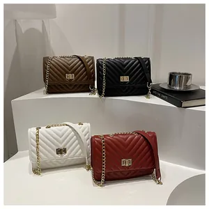 Quilted flap chain bags in brown, black, white, and burgundy with golden metal locks