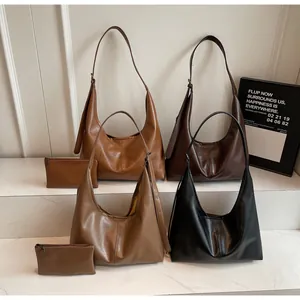 Grandi borse hobo in pelle marrone e nera con tracolla regolabile e pochette interna