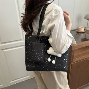 Large black star pattern tote bag with matching pouch and white cloud plush accessory