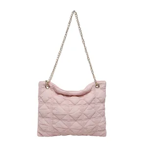 Chic pink quilted puff shoulder bag with golden chain strap for women casual style