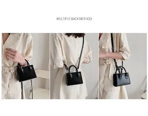 Detailed views of a mini black tote bag showing hand-carry, crossbody, and shoulder styles