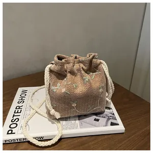 Women Woven Bucket Bag Floral Embroidery Drawstring Crossbody Bag With Cotton Rope Strap Pastoral Style Shoulder Bag