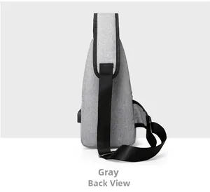 Detailed back view of grey oxford chest bag showing the USB charging port and stitching
