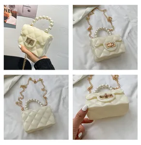 Detailed views of mini cream pearl tote bag with quilted texture and gold chain strap
