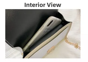 Interior view of the contrast color crossbody bag showing capacity for phone and wallet