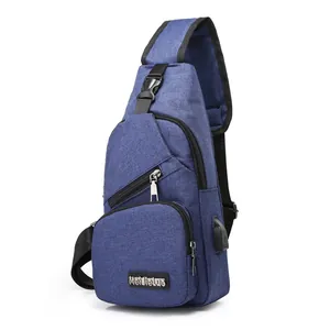 Blue oxford chest bag for men with multi-pocket design and external USB charging port