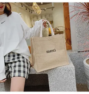 Grande borsa tote in lino con stampa merci e manici in corda per donna
