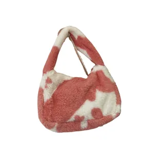 Pink and white cow print plush shoulder bag with minimalist soft faux fur texture