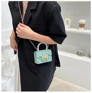 Mini mint green quilted crossbody bag with pearl handle and gold chain for women
