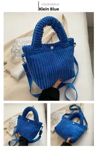 Detailed shot of Klein Blue corduroy bucket bag with adjustable strap and top handle