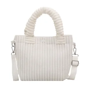 White corduroy bucket handbag with round handle and adjustable shoulder strap for women