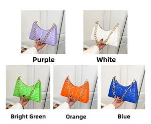 Detail view showing five colors of quilted PU leather chain bags with geometric patterns