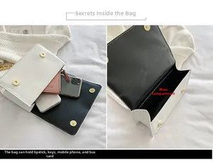 Detail view of the white PU leather crossbody bag showing its interior capacity for daily essentials