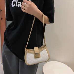 Sac sous le bras matelassé bicolore chic avec fermoir doré pour femme moderne