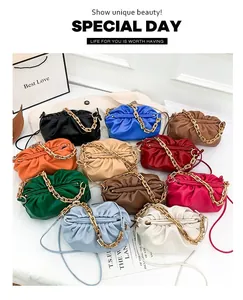 Collection of ruched cloud bags in vibrant colors with chunky gold chain straps