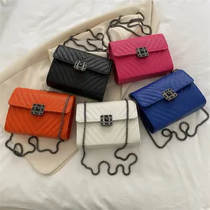 Five chevron quilted leather crossbody bags with metal chains in various colors