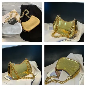 Detail shots of glossy crocodile pattern bags in gold and silver with thick metal chains