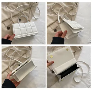 Vues détaillées d'un sac carré blanc matelassé avec dorures et une poignée supérieure