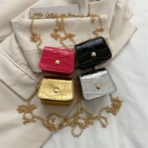 Mini stone pattern crossbody bags in four colors with gold chain straps and sleek metal buckles