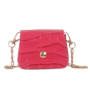 Mini rose red crossbody bag with crocodile pattern texture and golden chain strap