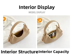 Detail view of beige textured handbag interior structure and large storage capacity