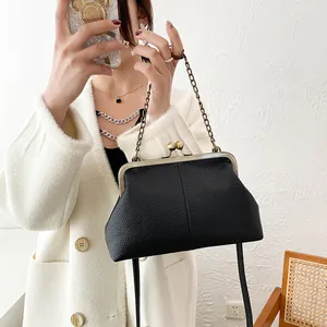 Vintage black lychee pattern shell bag with gold metal frame and chain handle for women
