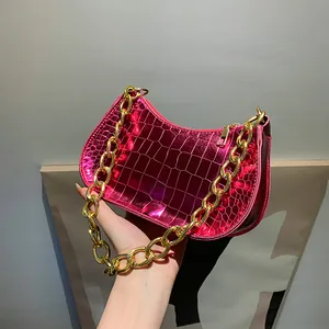 Glossy magenta faux leather shoulder bag with crocodile pattern and chunky gold chain