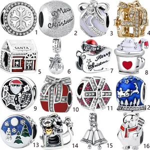 Macro display of 16 assorted Christmas charms featuring Santa and snowflakes for DIY jewelry