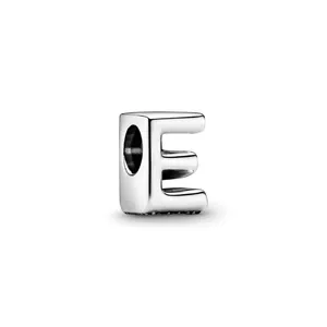 Close-up of polished silver metal letter E charm bead for DIY charm bracelets and necklaces
