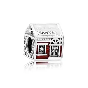 Christmas Santa house charm in silver alloy with red enamel and snowy roof design