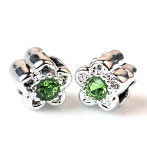 Silver flower beads with green crystal inlay for DIY charm bracelets and jewelry