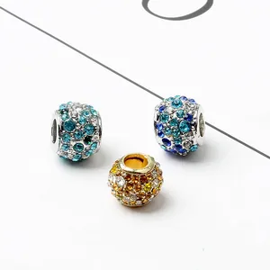 Macro shot of sparkling crystal-encrusted beads for DIY jewelry making and charms