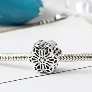 Vintage silver hollow flower charm bead on snake chain with detailed floral engravings