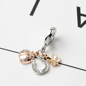 Three-in-one horseshoe clover and ladybug charm pendant with sparkling crystals for bracelets