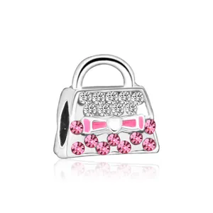 Detailansicht Silberanhänger Handtasche mit rosa Kristallen und Emaille-Schleife