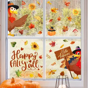 Vue détaillée des autocollants de dinde et citrouille de Thanksgiving sur une vitre