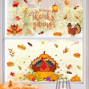 Détail de stickers de Thanksgiving pour vitres avec dinde, citrouille et feuilles d'automne