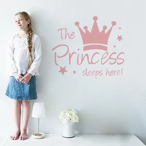 Pink crown wall decal with The Princess sleeps here text for girls bedroom decoration